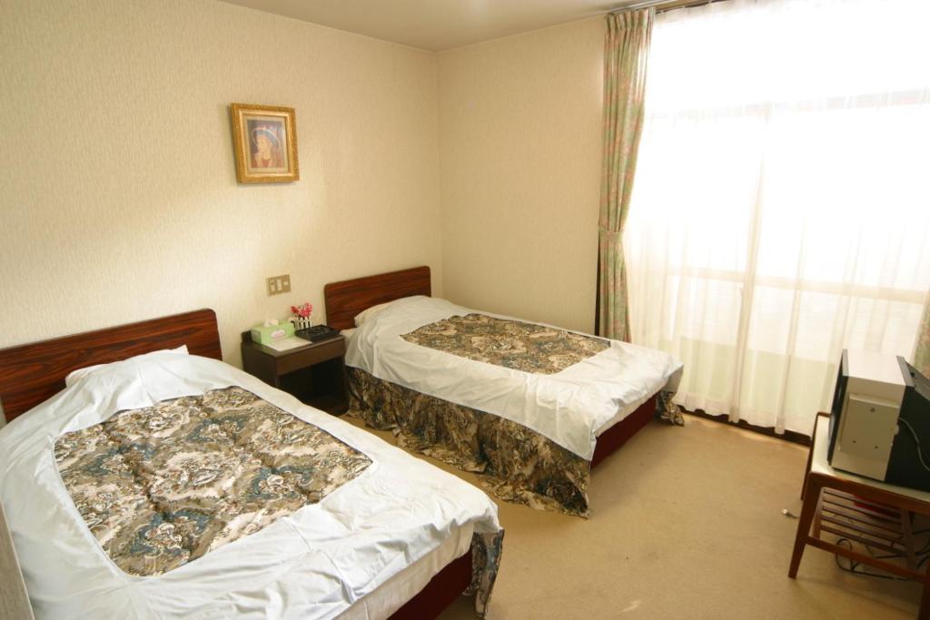 Hotel New Bernina Nagano Quarto foto